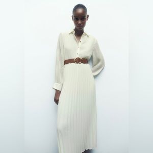 New with tags white pleaded dress.